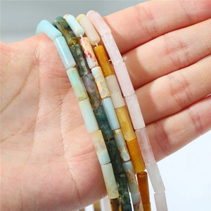 Macro shot of colorful cylindrical gemstone beads for DIY necklaces and bracelets