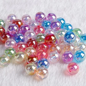Macro shot of colorful translucent AB acrylic beads for DIY jewelry making and crafts