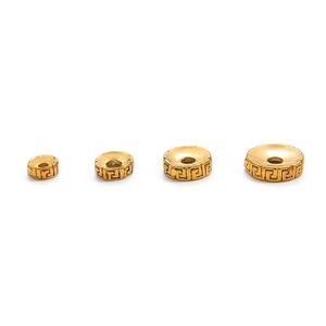 Set de cuatro cuentas espaciadoras de latón chapado en oro con greca para joyería DIY