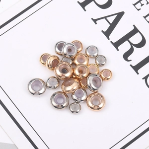 Polished gold and silver copper slide beads with silicone cores for DIY jewelry making