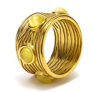 Bague vintage en acier titane doré avec quatre pierres naturelles jaunes et design texturé