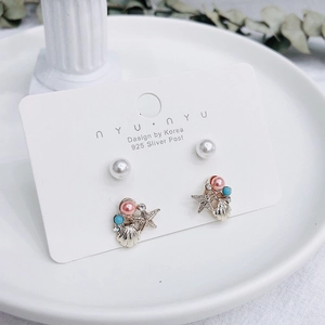 Set di orecchini in argento 925 con perle, stella marina dorata e ciondoli mare