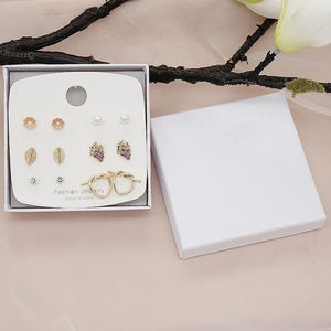 Set of six pairs of gold-plated earrings with pearls and crystals in a white gift box
