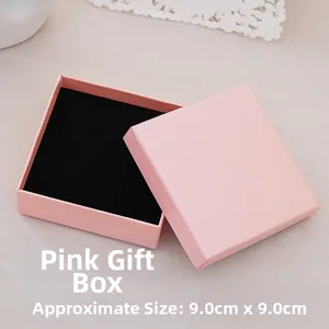 Elegant pink square jewelry gift box with black foam insert measuring 9.0cm by 9.0cm