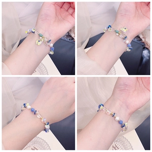 Handmade beaded bracelet with rose quartz aquamarine pearls and aurora star charm
