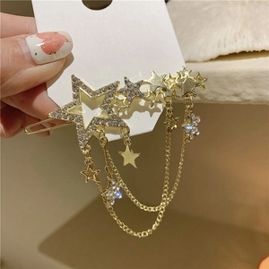 Elegant gold star fringe hair clip with sparkling rhinestones and dangling tassels