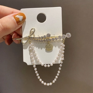Elegante Vergulde Legering Strik Strass Haarklem Met Kunstparelkwastje Dubbele Ketting Koreaanse Stijl Haaraccessoires Voor Vrouwen