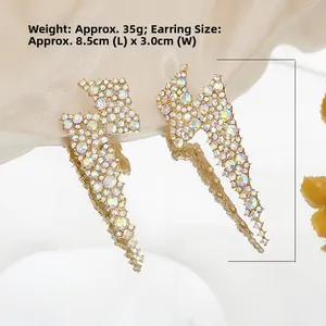 Detailed view of lightning bolt earrings with AB colorful rhinestones and gold alloy base