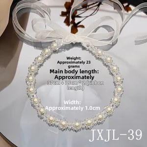 Detail of beaded necklace with pearls, crystals and ribbons showing size measurements