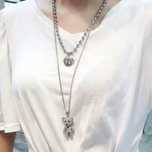 Collier double couche argenté avec pendentif ours en strass et pièce gravée LOVE