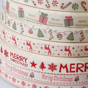 Christmas themed cotton ribbons with festive reindeer and snowflake prints for DIY crafts