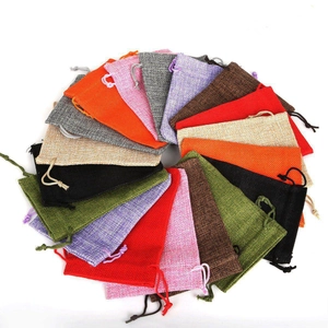 Colorful linen drawstring pouches for jewelry storage and gift packaging in various colors
