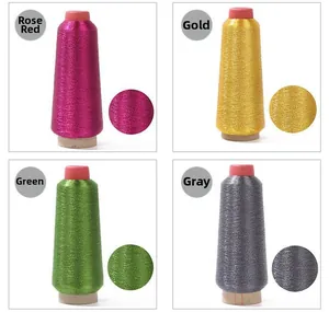 Detail of Rose Red, Gold, Green and Gray metallic embroidery thread spools with texture zoom