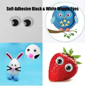 Gros plan sur les yeux mobiles adhésifs pour le bricolage d'enfants et projets créatifs