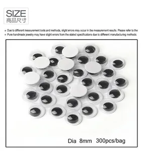 Gros plan d'yeux mobiles adhésifs de 8mm pour bricolage, pack de 300 pièces