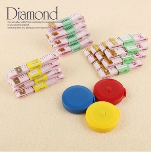 Close-up of colorful retractable 150cm 60-inch soft measuring tapes for sewing DIY crafts