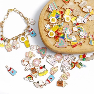 Assorted colorful enamel alloy charms with cartoon patterns and gold chain bracelet