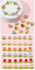 Macro view of gradient glass tulip flower beads for DIY jewelry and hair accessories