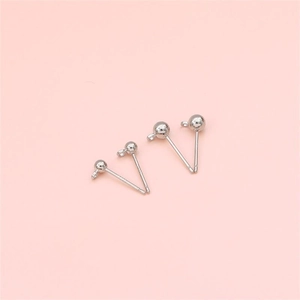Macro shot of 925 silver earring posts with small loops for DIY jewelry making crafts
