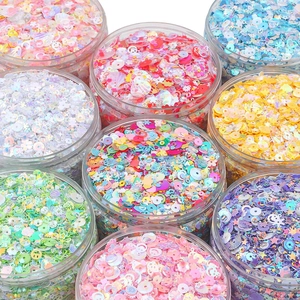 Colorful mixed sequins set in jars for DIY earring making with multiple shapes and colors
