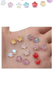 Macro view of colorful glass star beads for DIY handmade jewelry and accessory making