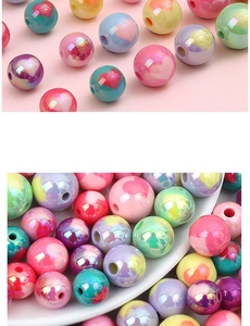 Macro view of colorful acrylic heart beads with pearl finish for DIY jewelry crafts