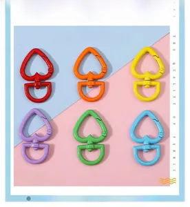 Macro shot of colorful heart-shaped spring ring clasps for DIY jewelry making