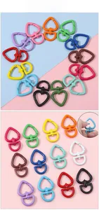 Detailed macro view of heart-shaped spring alloy clasps in various vibrant colors