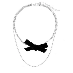 Collar de doble capa plateado con cadena de strass y colgante de lazo de terciopelo