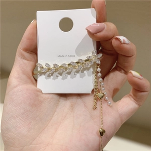 Barrette à cheveux style coréen avec cristaux et pompon perlé sur base dorée