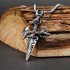 Retro punk titanium steel pendant necklace with vajra pestle and red gem on wood