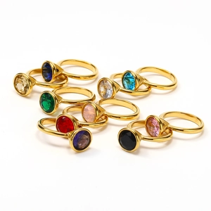 Colorful zircon rings in 18k gold plated titanium steel shown in various gemstone colors