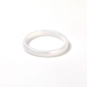 Minimalist white ceramic band ring with a smooth polished finish and sleek modern look