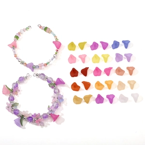 Macro display of colorful acrylic calla lily beads for handmade DIY jewelry making