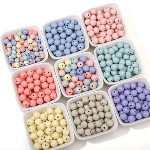 8-10mm acrylic cream round beads for DIY jewelry in organized white sorting trays