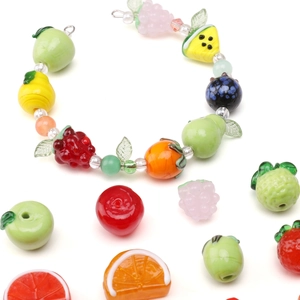 Handmade glass fruit beads set for DIY jewelry with apple strawberry and grape shapes