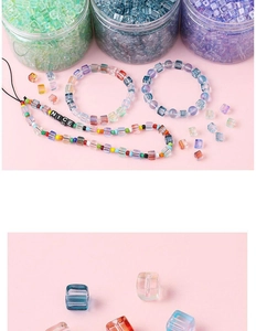 Macro detail of 7mm colorful gradient square glass beads with DIY handmade jewelry crafts