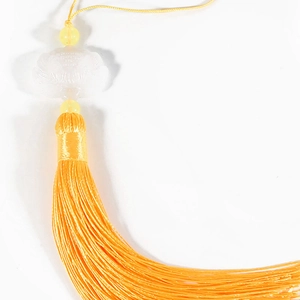 Traditional Chinese yellow silk tassel with carved lotus bead for fans and bookmarks