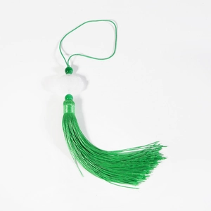 Traditional green Chinese tassel pendant with white cloud carving and jade-like beads