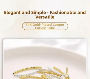 Macro detail of 14K gold filled copper curved tubes with textured and polished finishes