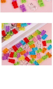 Detailed view of colorful transparent acrylic gummy bear beads for DIY jewelry making
