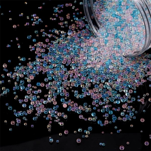 Rainbow aurora glass bubble beads for DIY jewelry and nail art crafts in a bulk bottle