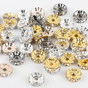 Flache Rondelle-Abstandsperlen mit weißen Strasssteinen in Gold, Silber und Schwarz