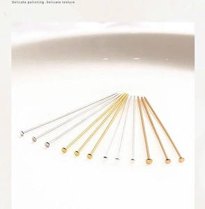 Detailed macro view of 14K gold plated T-pins in silver gold and rose gold finishes