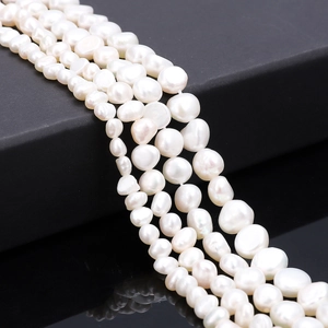 Baroque natural freshwater pearl necklaces strings on black jewelry box display