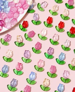 Macro shot of colorful glass tulip beads for DIY jewelry making in various pastel shades