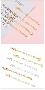 Detail of 14K gold and silver plated extender chains with heart, star, and tulip charms