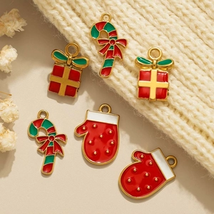 Christmas enamel charms set featuring candy canes, gift boxes, and winter mittens for DIY