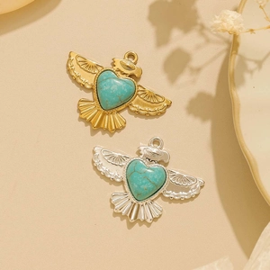 Western cowboy style bird pendant with turquoise inlay in gold and silver finishes
