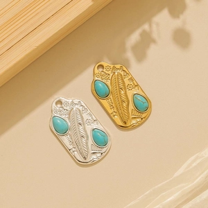 Navajo vintage μενταγιόν από ανοξείδωτο ατσάλι με τιρκουάζ και ανάγλυφο φτερό